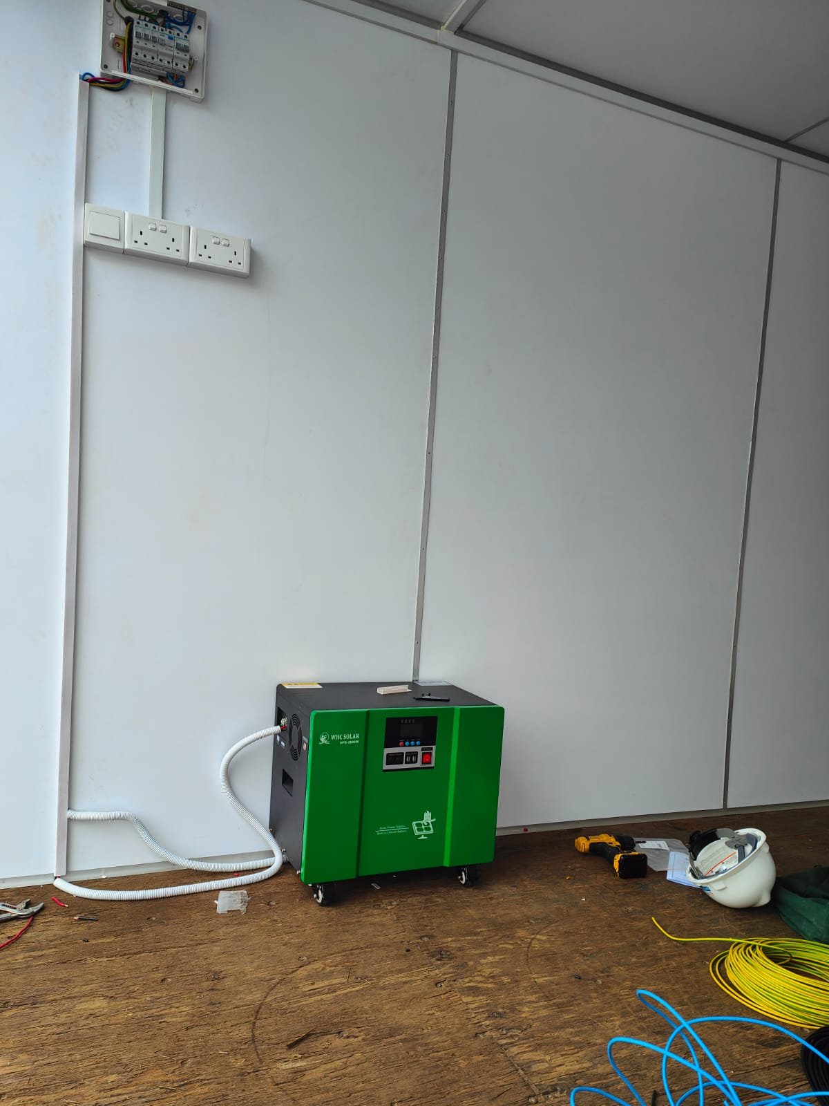 2kW solar panel array mounted on top of storage containers at Tanjong Gul Camp